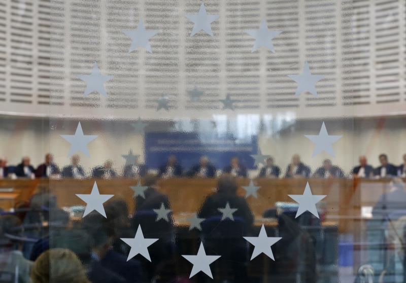 Judges of the European Court of Human Rights sit in the courtroom during a hearing at the European Court of Human Rights in Strasbourg, June 10, 2015.