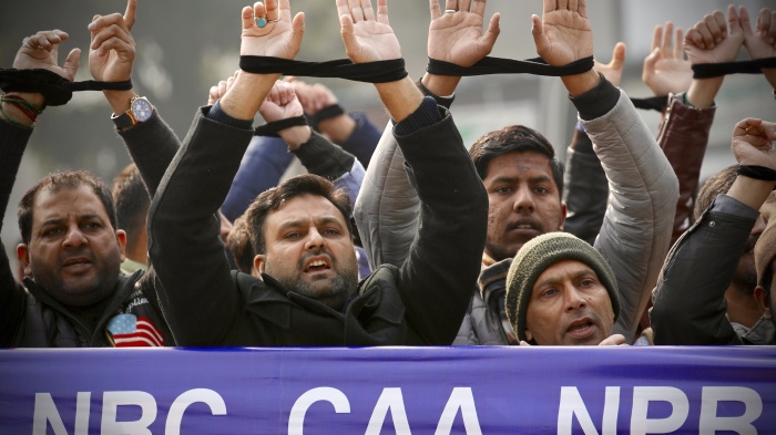 Protesters demonstrate against the Citizenship Amendment Act in New Delhi, India