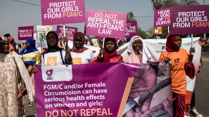 Protesters against female genital mutilation (FGM) demonstrate outside the National Assembly in Banjul, Gambia, on March 18, 2024. 