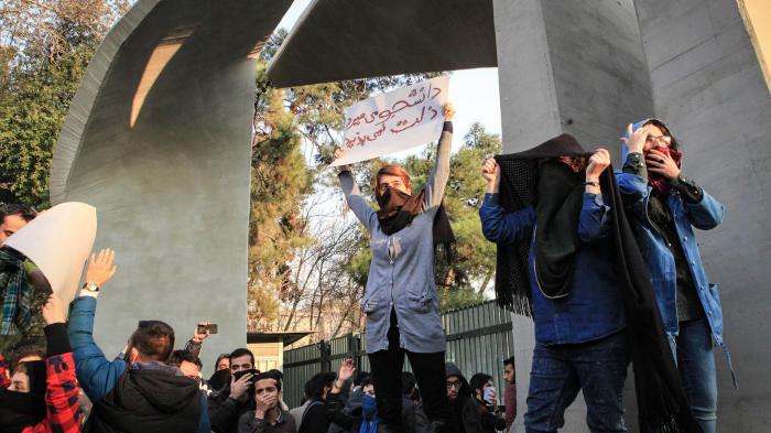 Iranian students protest at the University of Tehran during a demonstration driven by anger over economic problems, in the capital Tehran on December 30, 2017.