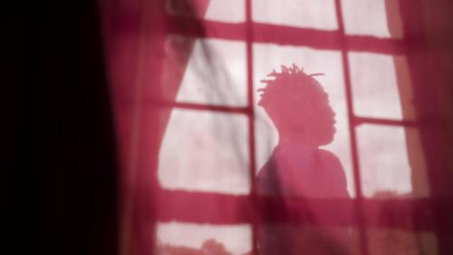 A young transgender woman at a friend’s house seeking temporary shelter in Lilongwe, Malawi.