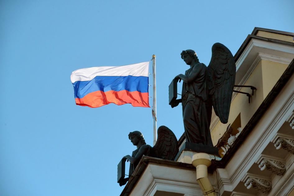 The Russian flag flies on a courthouse building in St. Petersburg, Russia, March 15 2020.