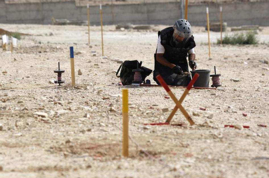 A member of the Palestinian security forces takes part in a training session to find and remove landmines, organised by the Palestinian Ministry of Interior and the United Nations, in the West Bank city of Jericho June 25, 2012.