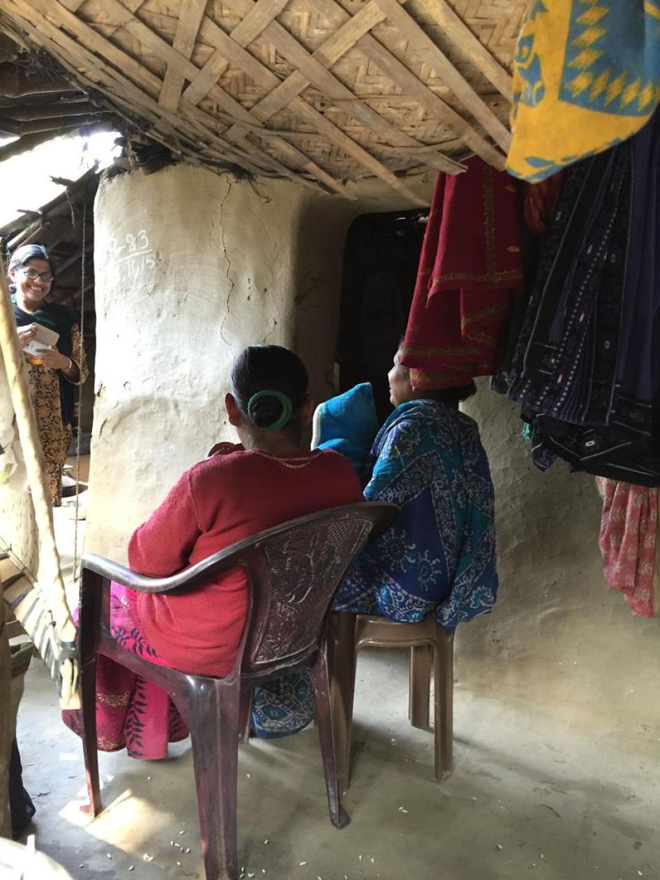 Shampa Sengupta, a disability rights activist, greets Kanchana, a 19-year-old woman with an intellectual disability, her mother, and Kanchana’s young son. 