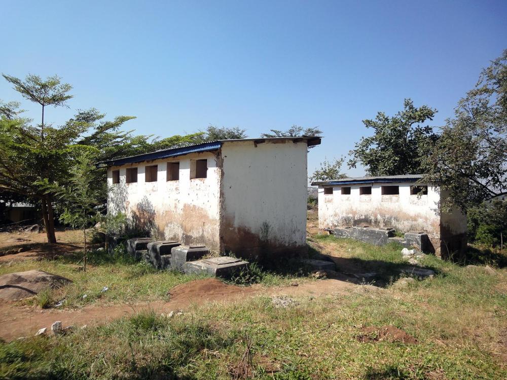 Old female and male latrines at a secondary school in Mwanza, northeastern Tanzania. 