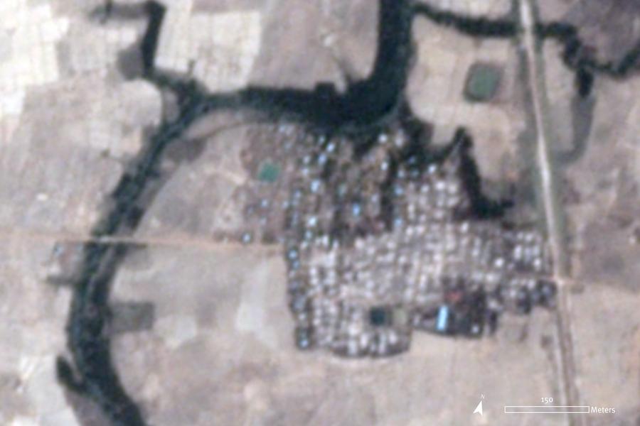 Satellite imagery recorded on May 18, 2020, shows approximately 200 buildings affected by fire in Let Kar village, which likely occurred on May 16 around 2 p.m. local time.