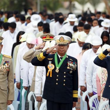 Myanmar military officers salute at their national flag during a ceremony to mark the 72nd anniversary of Independence Day in Naypyitaw, Myanmar. 