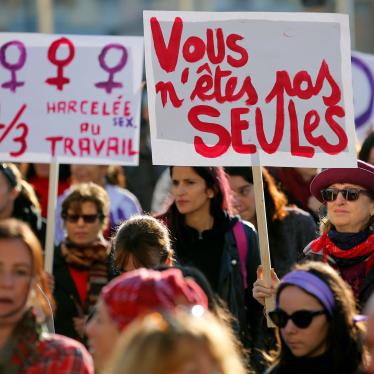 Demonstrators attend a rally against gender-based violence in Marseille, France, November 24, 2018. The banners read "You are not alone" and "harassed at work."