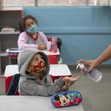 Student receives hand sanitizer at a public school in São Paulo on the first day of in-person classes, on February 8th.