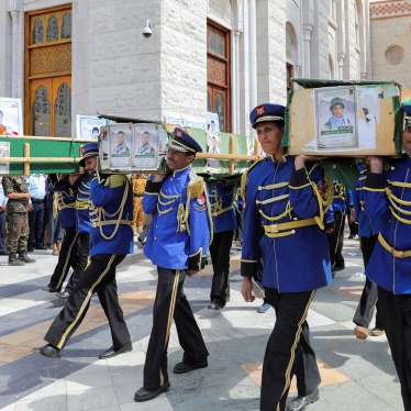 Honor guards carry the coffins of Houthi fighters killed by US-led airstrikes during a funeral in Sanaa, Yemen, February 10, 2024. 