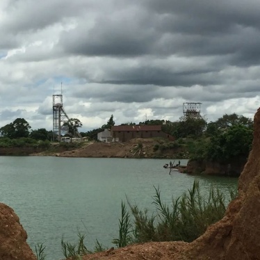 View of a former mine pit, now flooded, at the old mine site in Kabwe.