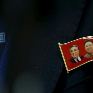 A pin of former North Korean leaders Kim il-Sung and Kim Jong-il is seen on Ri Hung Sik, Ambassador at-large of the North Korean Foreign Ministry during a news conference at the North Korean Mission to the United Nations in New York on November 17, 2015. 