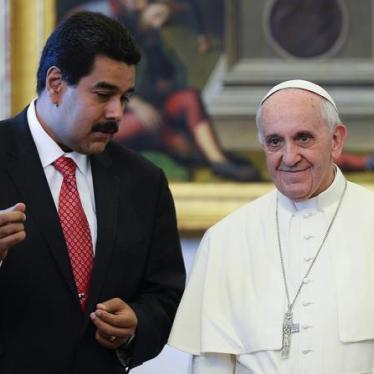 Pope Francis poses with Venezuela's President Nicolas Maduro during a meeting at the Vatican on June 17, 2013. 