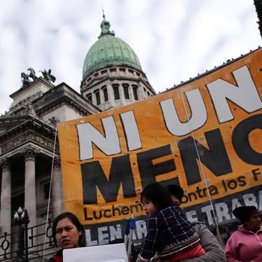 A banner that reads, "Not another (woman) less" is seen outside the Congress during a demonstration against femicides and violence against women in Buenos Aires, Argentina, June 3, 2017