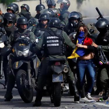 A demonstrator is detained by security forces during clashes at a protest against Venezuelan President Nicolas Maduro's government in Caracas, Venezuela, July 10, 2017. 