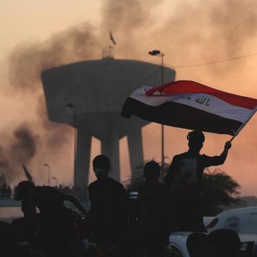 Anti-government protesters chant slogans during a protest in Baghdad, Iraq