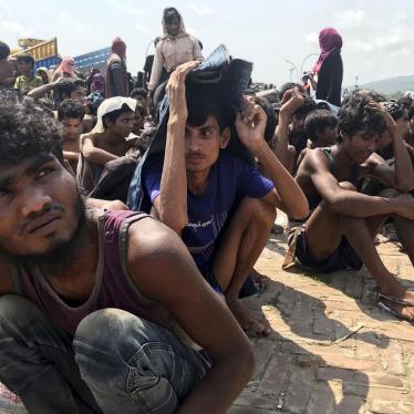 Rohingya refugees gather after being rescued in Teknaf near Cox’s Bazar, Bangladesh, April 16, 2020.