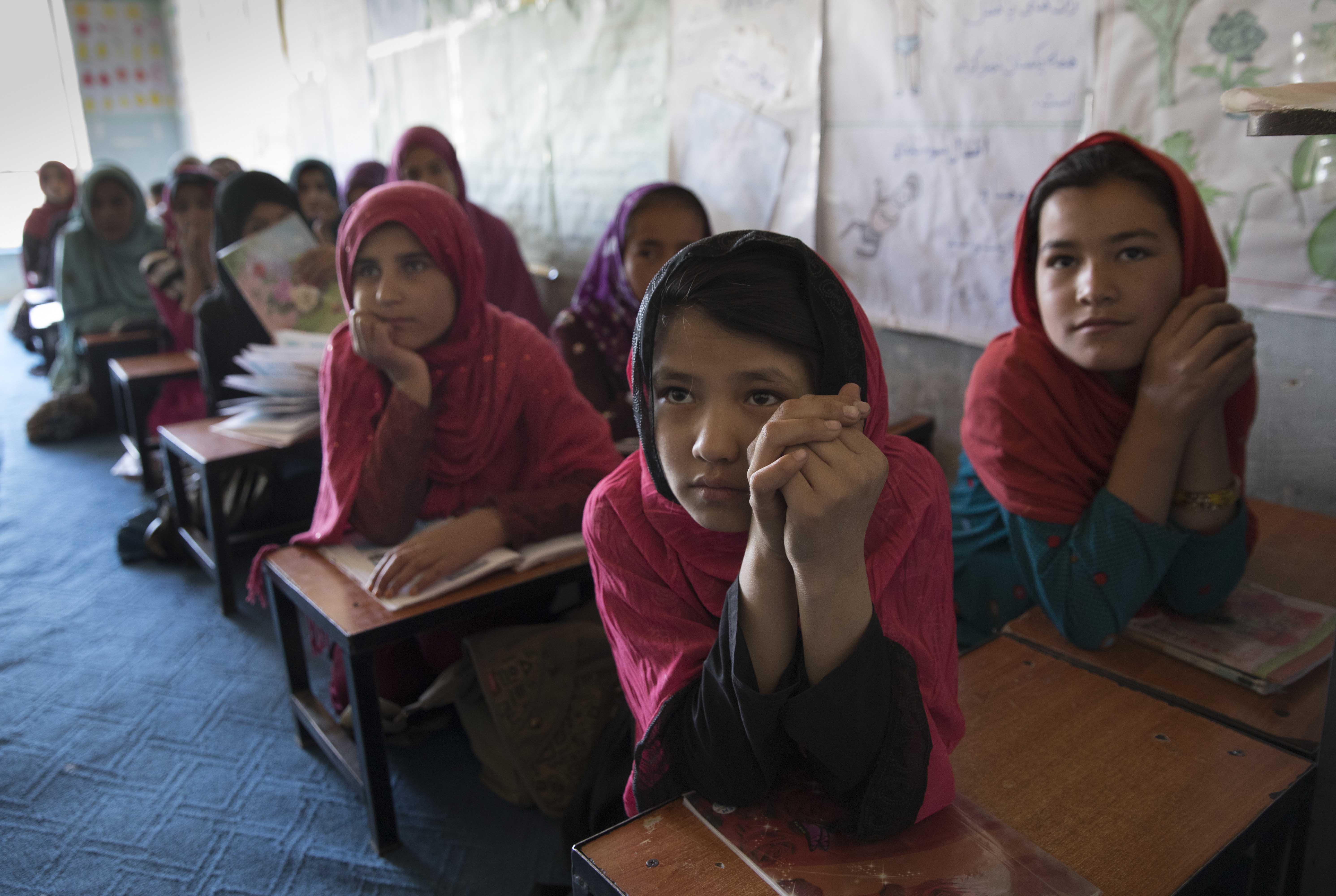 Students at a community-based education program in Kabul