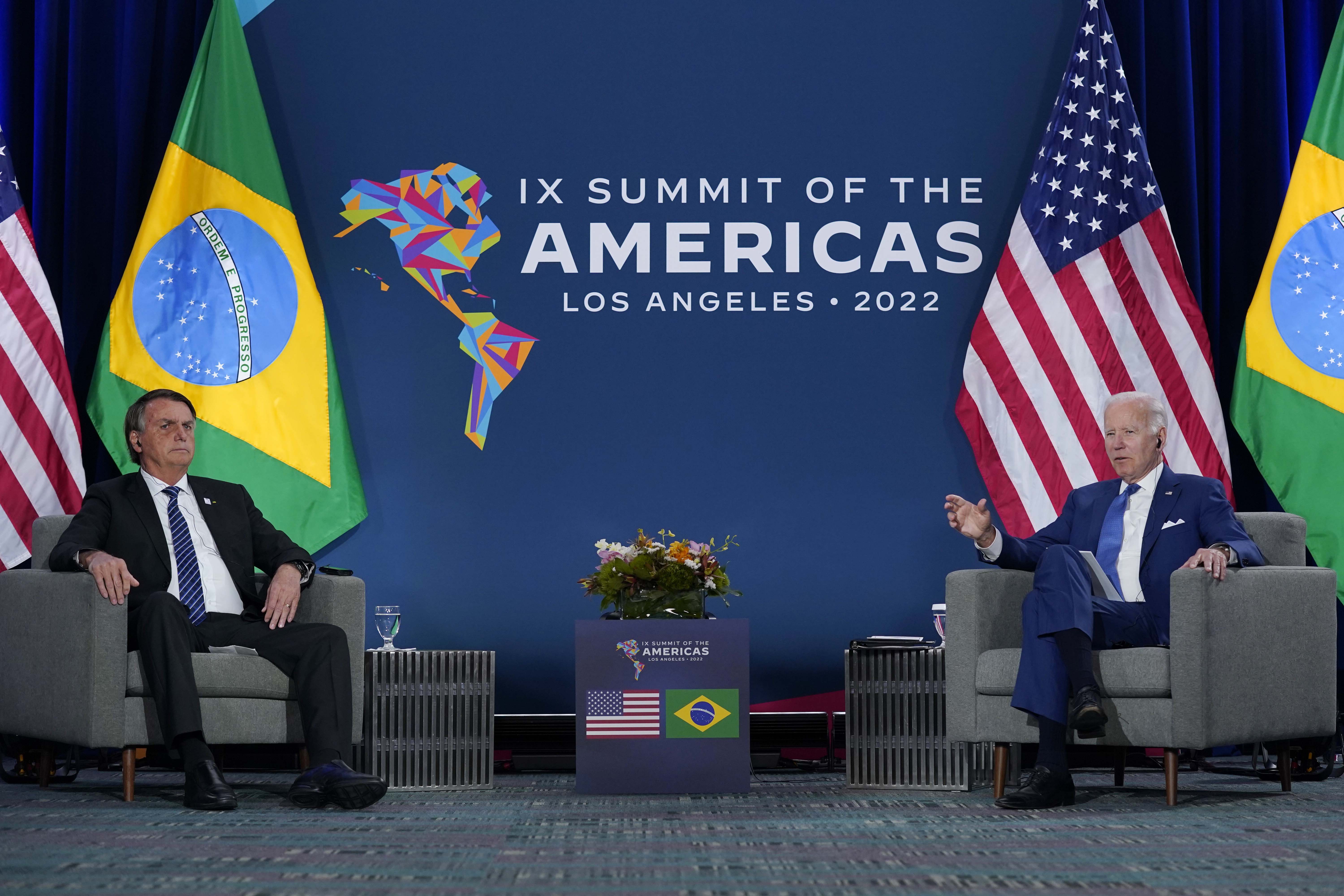 US President Joe Biden, right, meets with Brazilian President Jair Bolsonaro