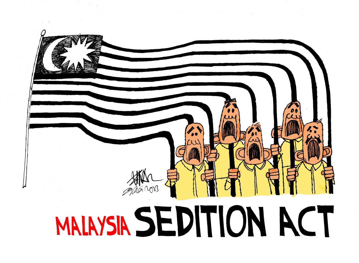 漫画家祖纳（Zunar）讽刺马来西亚政府滥用《煽动法》逮捕监禁批评人士的作品。