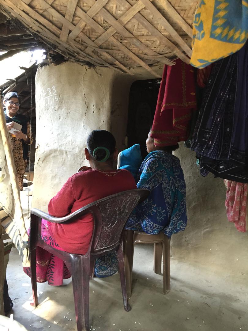 Shampa Sengupta, a disability rights activist, greets Kanchana, a 19-year-old woman with an intellectual disability, her mother, and Kanchana’s young son. 