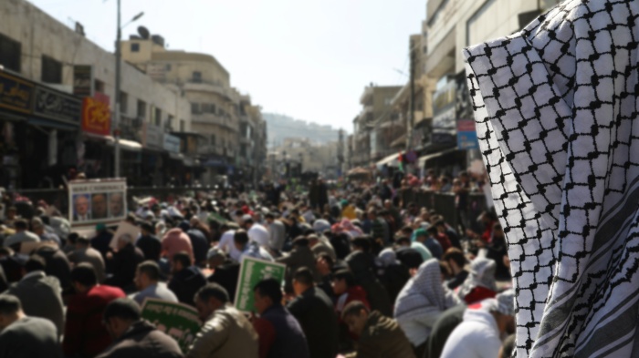 People attend a protest in support of Palestinians in Gaza in Amman, Jordan, November 24, 2023.