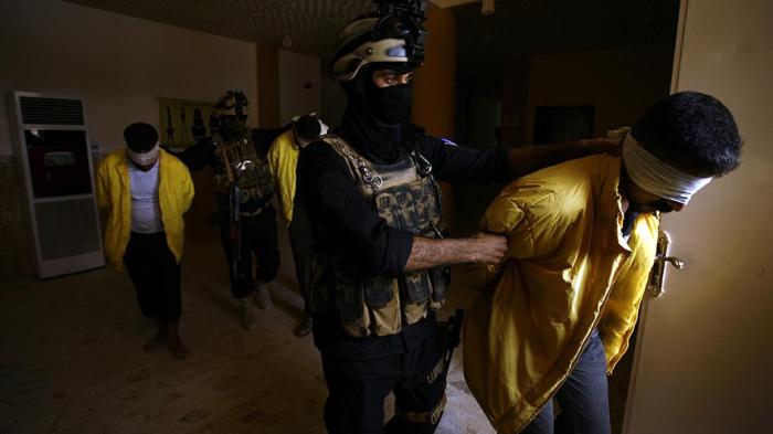 Iraqi Military hold ISIS suspects