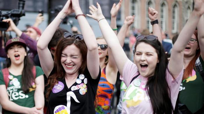 Women celebrate the result of yesterday's referendum on liberalizing abortion law, in Dublin, Ireland, May 26, 2018.