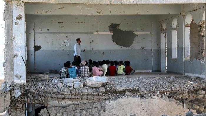 Children attending class on the first day of school. An airstrike damaged the school during fighting between Saudi-led coalition-backed Yemeni government forces and Houthi forces, Taizz, Yemen, September 3, 2019.