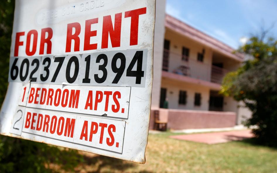 A rental sign is posted in front of an apartment complex in Phoenix, Arizona, July 14, 2020. 