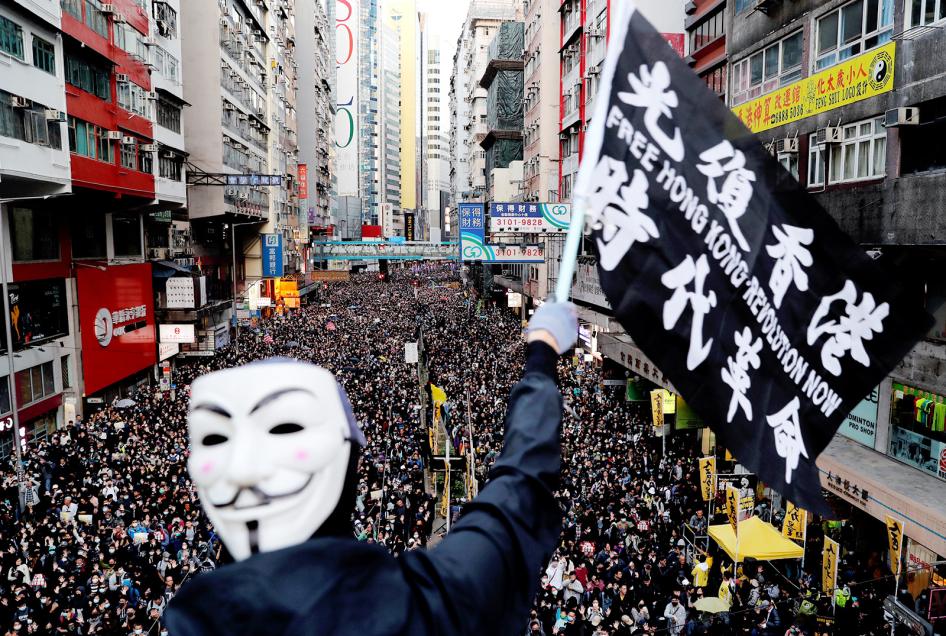 The slogan in Chinese on the flag, “Liberate Hong Kong, the Revolution of Our Times,” was a common chant during the 2019 protests. But since the imposition of the National Security Law, Hong Kong authorities have prohibited both the chant and pro-democracy protests have been prohibited in Hong Kong. The group that has long organized peaceful marches, Civil Human Rights Front, is also no longer functioning and its convenor has been in custody since.