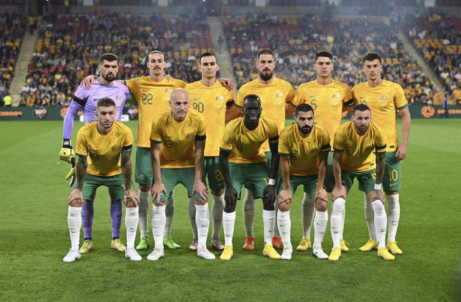 The Australian national soccer team, the Socceroos, pose for a photo before the start of a game in Brisbane, Australia.
