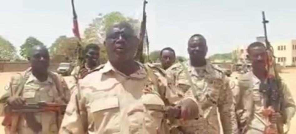 Soldiers holding guns in a screenshot from a video 