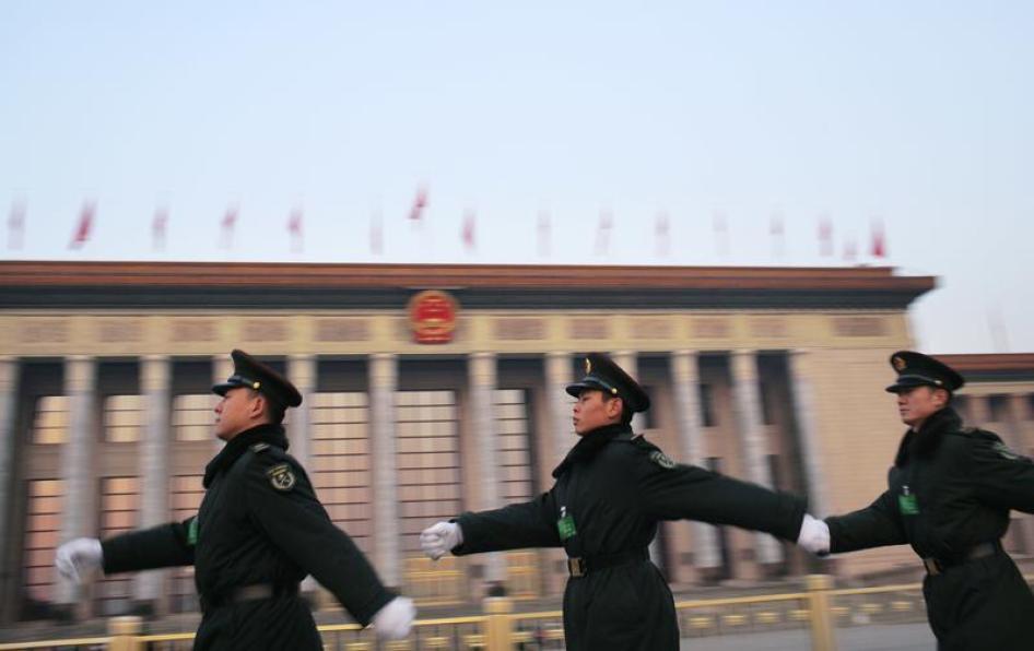 Paramilitary soldiers guard near the Great Hall of the People in Beijing, March 5, 2015.