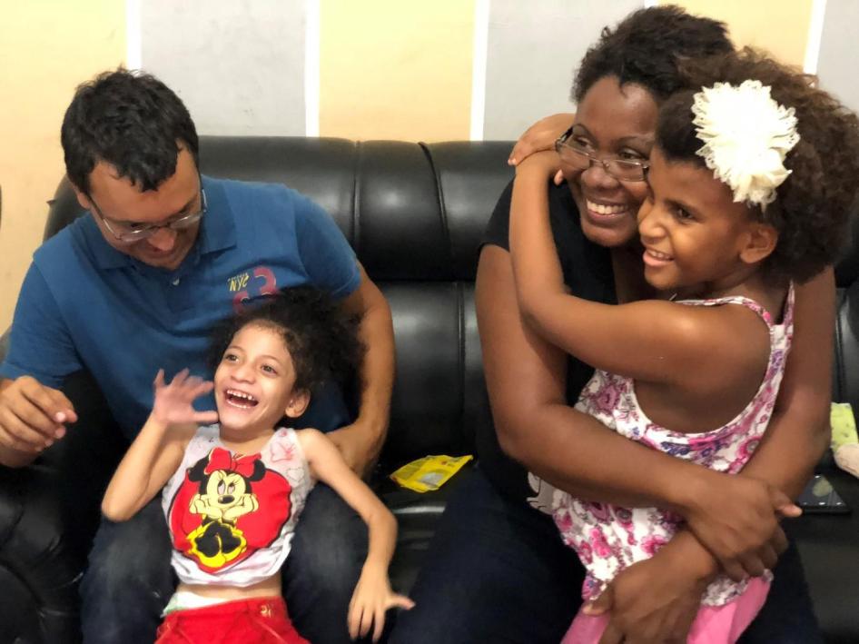 Neiva Correa Marins and Carlos Eduardo Cruz are a couple from Rio de Janeiro who adopted Silvana and Sofia, ages 3 and 4, two girls with intellectual disabilities in 2016. “They started to thrive when we took them to our home,” Correa Marins said.