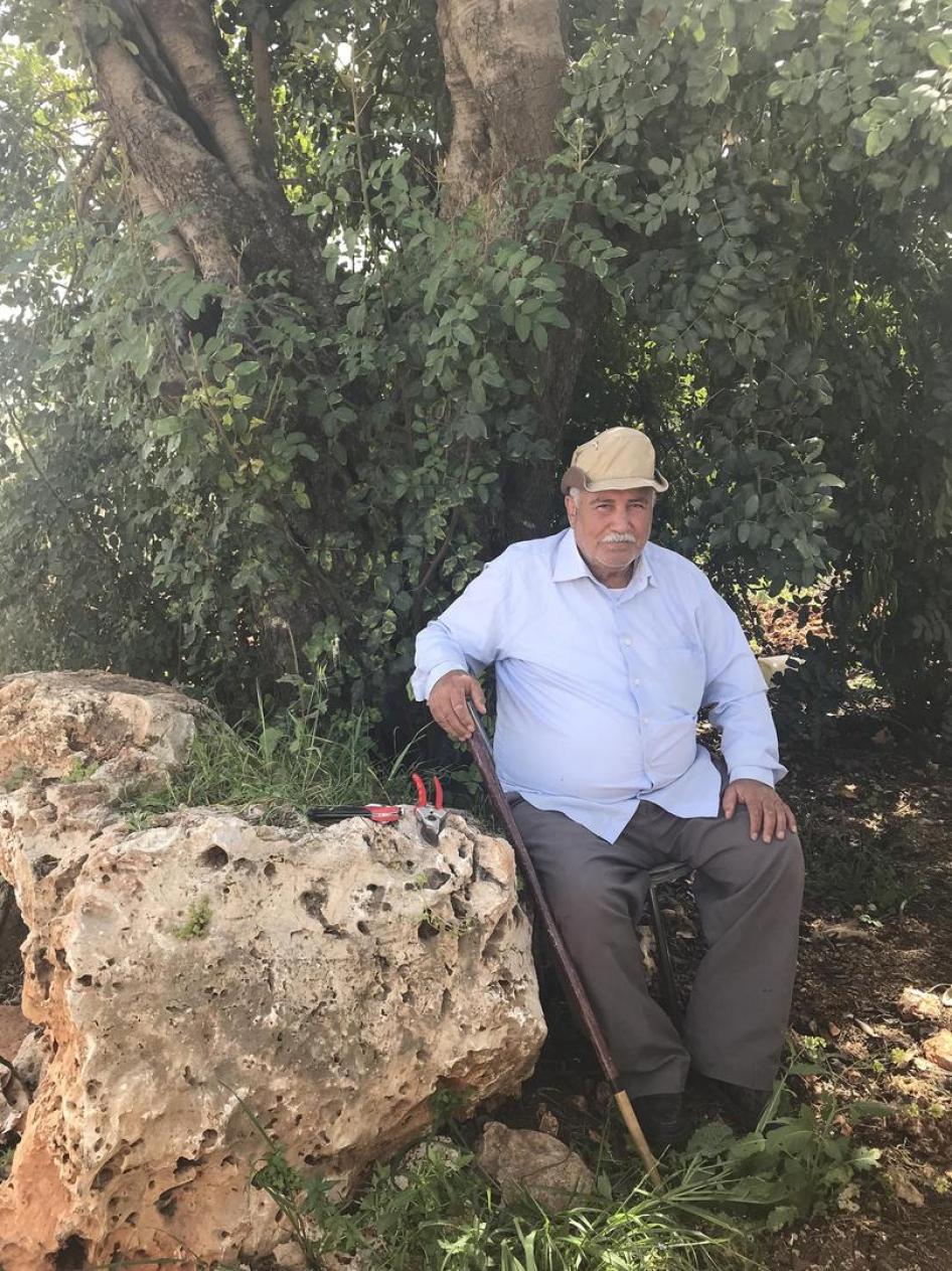 Palestinian farmer Anwar Abu Khalil, who can only access part of his land with great difficulty due to the separation barrier around the settlement of Alfei Menashe.