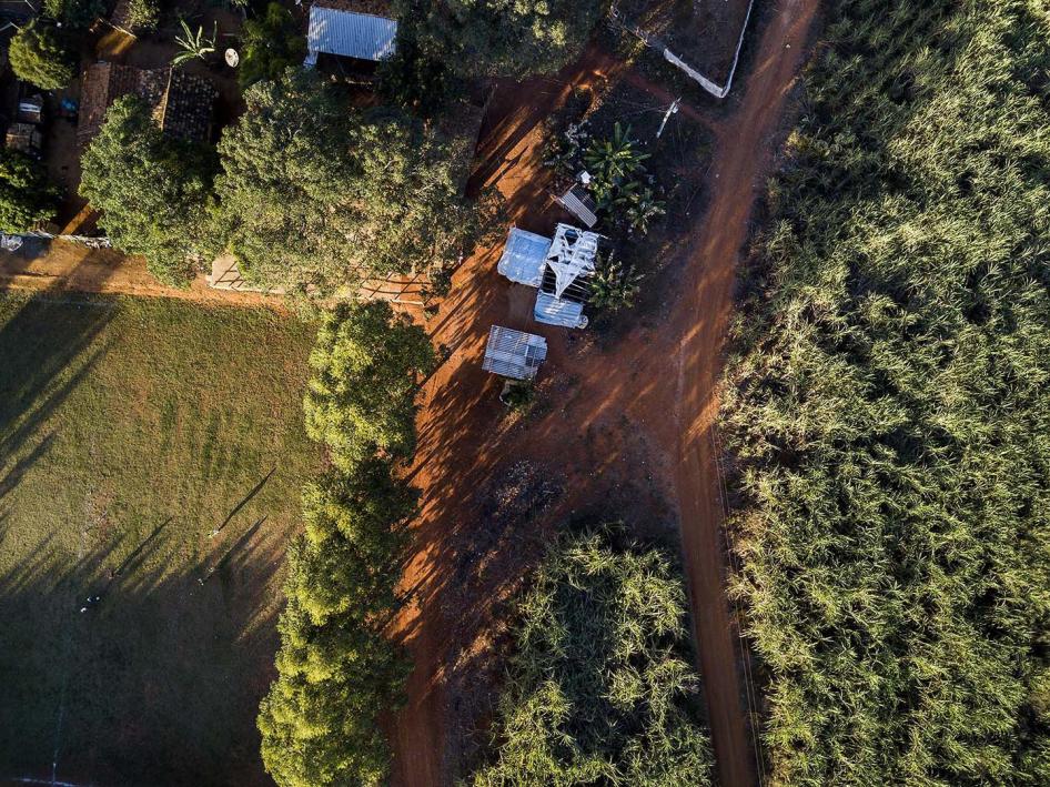 Drone view of a quilombo (Afro-Brazilian) community in Minas Gerais State, southeast Brazil. Some of the houses are around 20 meters from the adjacent sugarcane plantation. 