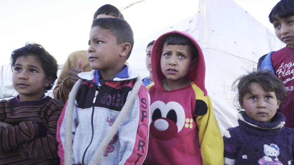 Des enfants syriens dans un camp informel de réfugiés dans la vallée de Bekaa.