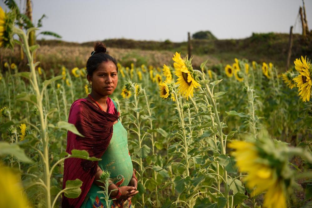 Sharmila G., 14, eloped at age 12 and married an 18-year-old man. At the time this picture was taken she was seven months pregnant. She said that when rumors spread in her village about her relationship with her then-boyfriend, her parents tried to separa