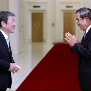 Cambodian Prime Minister Hun Sen, right, greets with Japanese Foreign Minister Toshimitsu Motegi, left, before a meeting at the Peace Palace, in Phnom Penh, Cambodia on Saturday, August 22, 2020. 