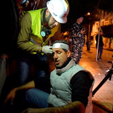 An injured journalist receiving treatment after clashes between security forces and demonstrators during a protest in Beirut, Lebanon on January 14, 2020.