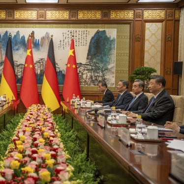 German Chancellor Olaf Scholz sits opposite of Chinese President Xi Jinping during talks at the State Guest House in Beijing, China, April 16, 2024.
