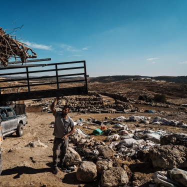 A family packs up their belongings in Khirbet Zanuta, in the southern West Bank, on October 30, 2023. Attacks by settlers, in some cases accompanied by soldiers, forced all the residents to leave.