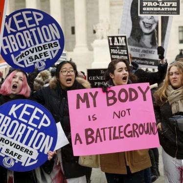 Pro-abortion supporters demonstrate in front of the U.S. Supreme Court (not pictured) during the National March for Life rally in Washington January 22, 2016.