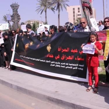 Demonstrators in Baghdad call International Women's Day a "day of mourning" in protest of Iraq's new draft Jaafari Personal Status Law. 