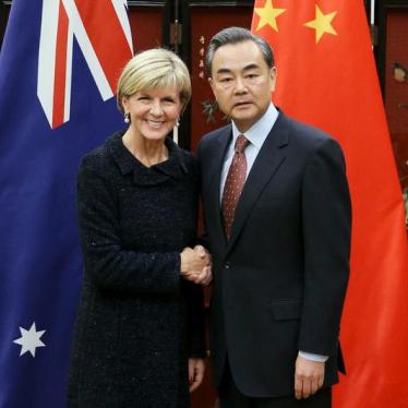 Australian Foreign Minister Julie Bishop (L) shakes hands with Chinese Foreign Minister Wang Yi as she arrives for a meeting at the Ministry of Foreign Affairs in Beijing, China, February 17, 2016.