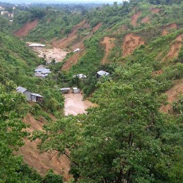 This general view shows dwellings under mud after a landslide in Rangamati on June 13, 2017. 