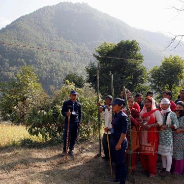 Villagers wait to vote at a polling station during the parliamentary and provincial elections in Sindhupalchok district, Nepal, November 26, 2017.