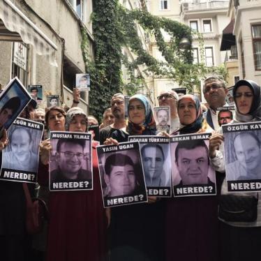 Wives of six men who went missing in February 2019 join the weekly Saturday Mothers vigil in Istanbul for families of disappeared people in Turkey, July 2019. 