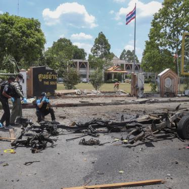 Thai crime scene investigators inspect the site of a bomb explosion in Yala, southern Thailand, Tuesday, March 17, 2020.